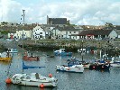 Porthleven inner harbour and Fore Street. 25 May 2003.